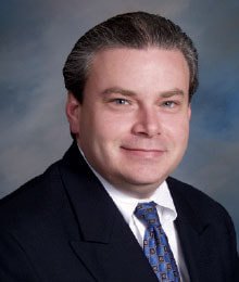 Dr. David E. Auer, MD