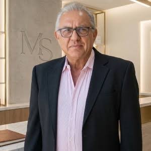 Dr. Maninder Guram, MD